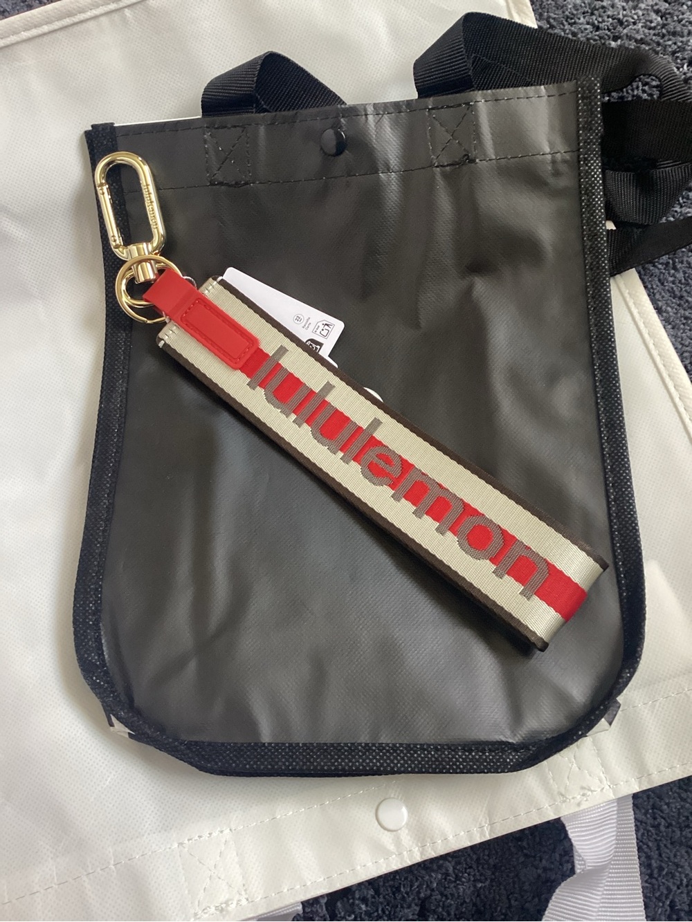 Lululemon Red and Cream Logo Key Strap